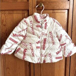 Moncler Kids White Puffer Jacket with Red Logo Allover